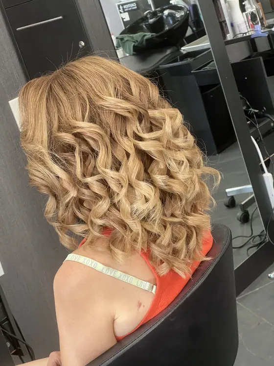 Golden blonde ringlet curls, full length