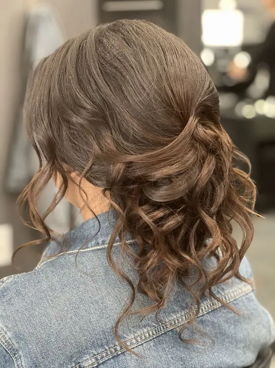 Brunette half-up style with soft waves