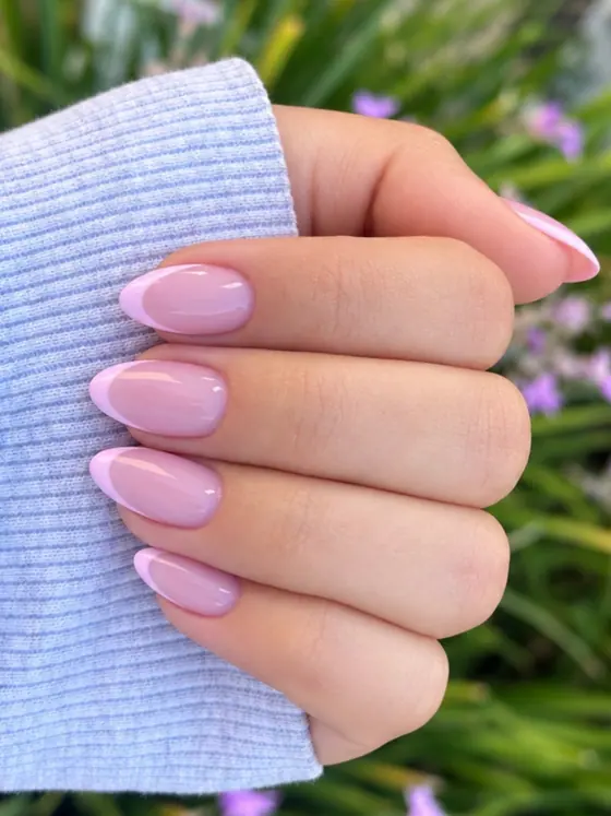 Glossy pink almond manicure