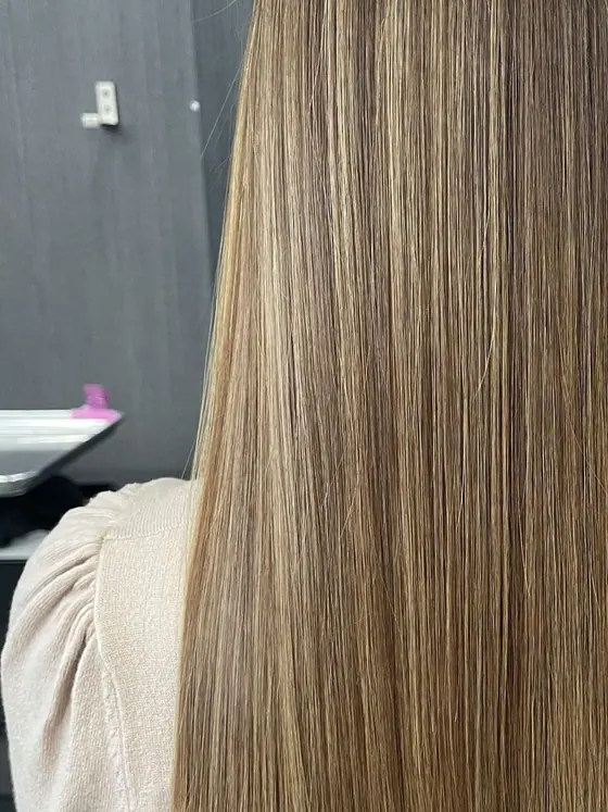 Cool ash blonde, straightened to a glass finish