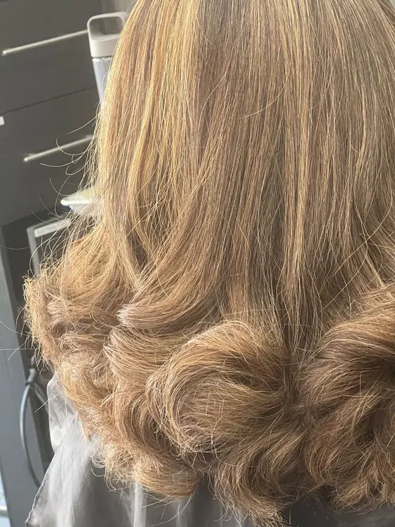 Bronde curled bob with a round finish