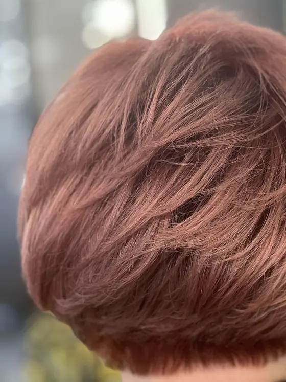 Rose gold pixie cut with a soft crown