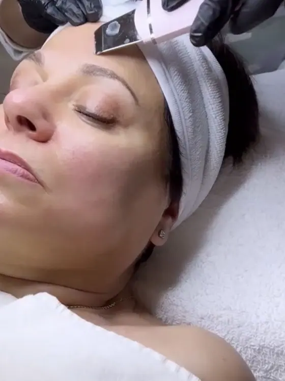Brow and skin treatment in the salon's facial room